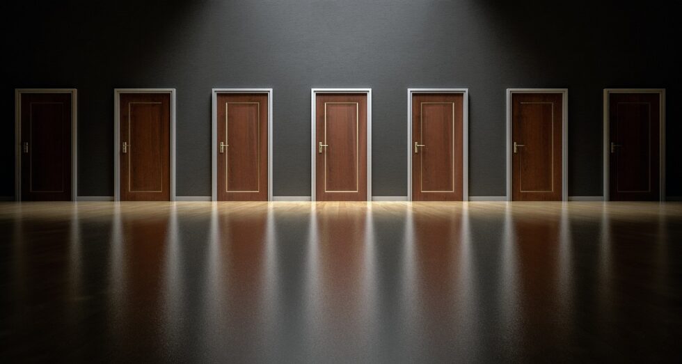 Row of closed doors in a dark room, symbolizing life choices, family decisions, and grandparenting transitions