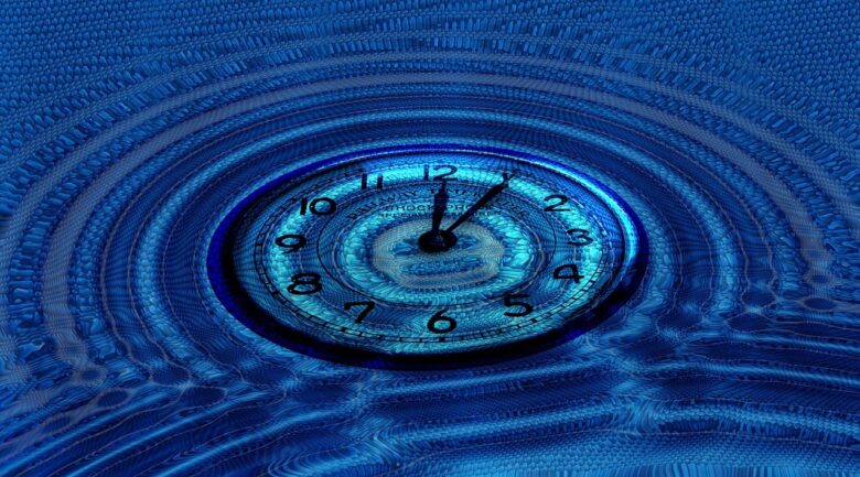 Blue abstract clock image with rippling water effect, symbolizing the passage of time, family legacy, and grandparenting reflections on generations.