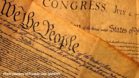 Aged parchment featuring the United States Declaration of Independence, highlighting American history and lessons grandparents can share with grandchildren.