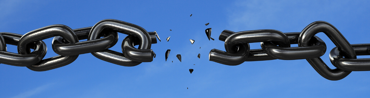 Broken black chain snapped in the middle against a blue sky, symbolizing separation in long-distance grandparenting.