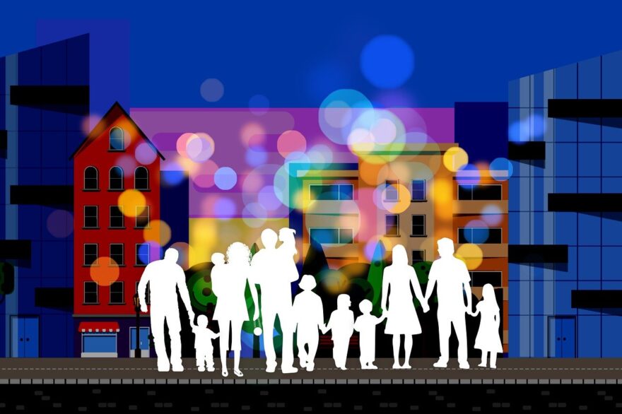 Silhouetted multigenerational family standing together in front of a city scene, representing grandparenting, family connection, and intergenerational support